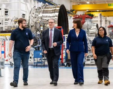Sir Keir Starmer, leader of the Labour Party, and Shadow Chancellor Rachel Reeves during a visit to Rolls Royce in Derby on the General Election campaign trail - walkimg through the factory with two people
