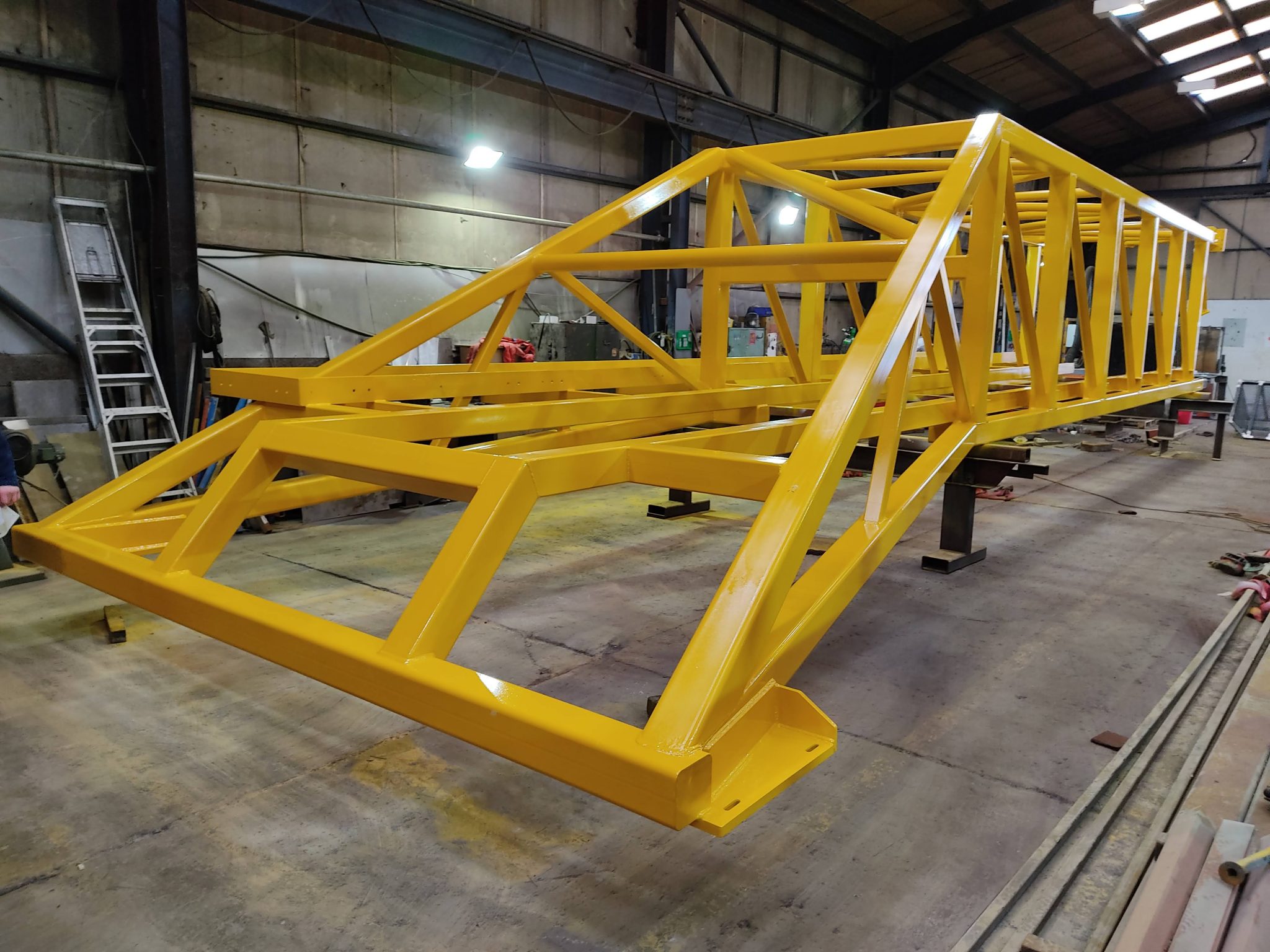 Moving gantries fresh from the paint shop Fairfield Engineering Solutions