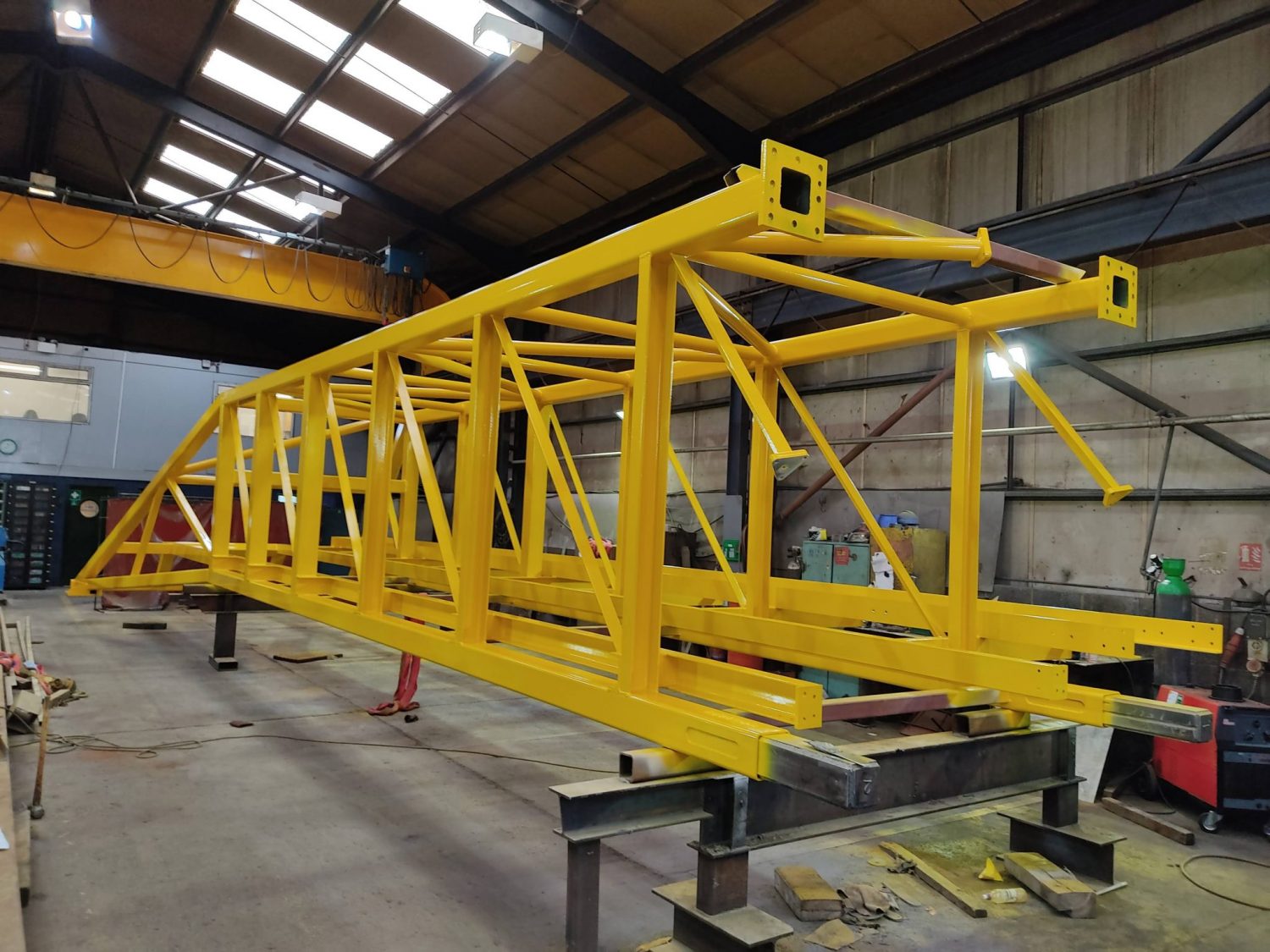 Moving gantries fresh from the paint shop Fairfield Engineering Solutions